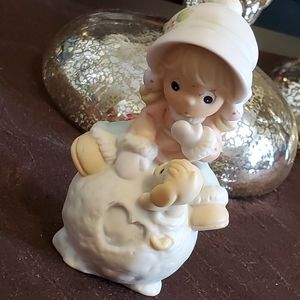 Avon Special Moments figurine girl and dog making snowman